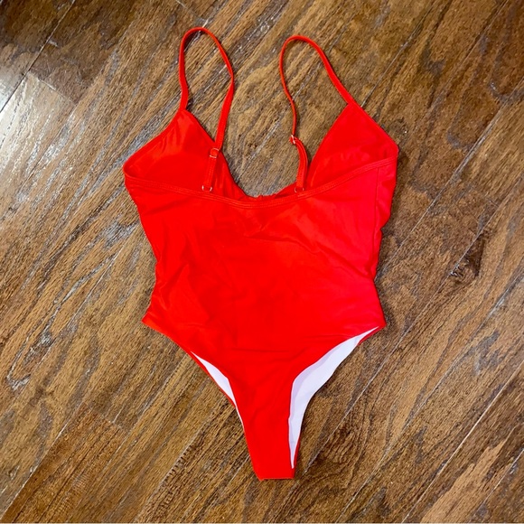 Knot Front Cut-Out One Piece Swimsuit
Color: Red - Picture 14 of 14